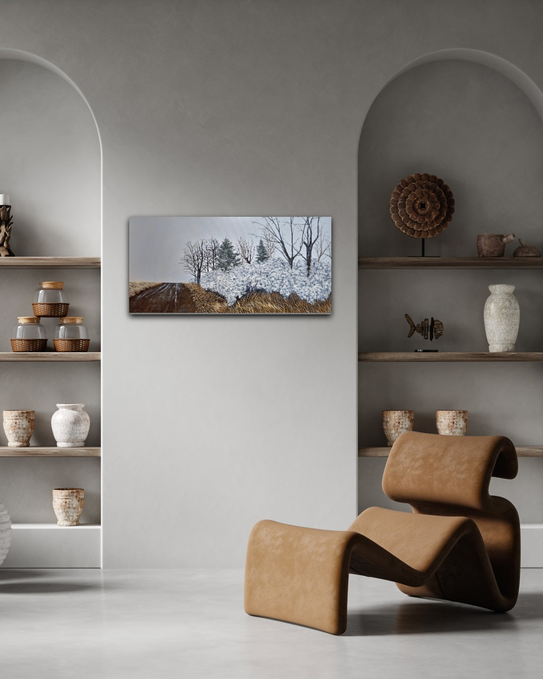 Modern interior with a brown chair, shelves with decorative items, and a wall art piece.