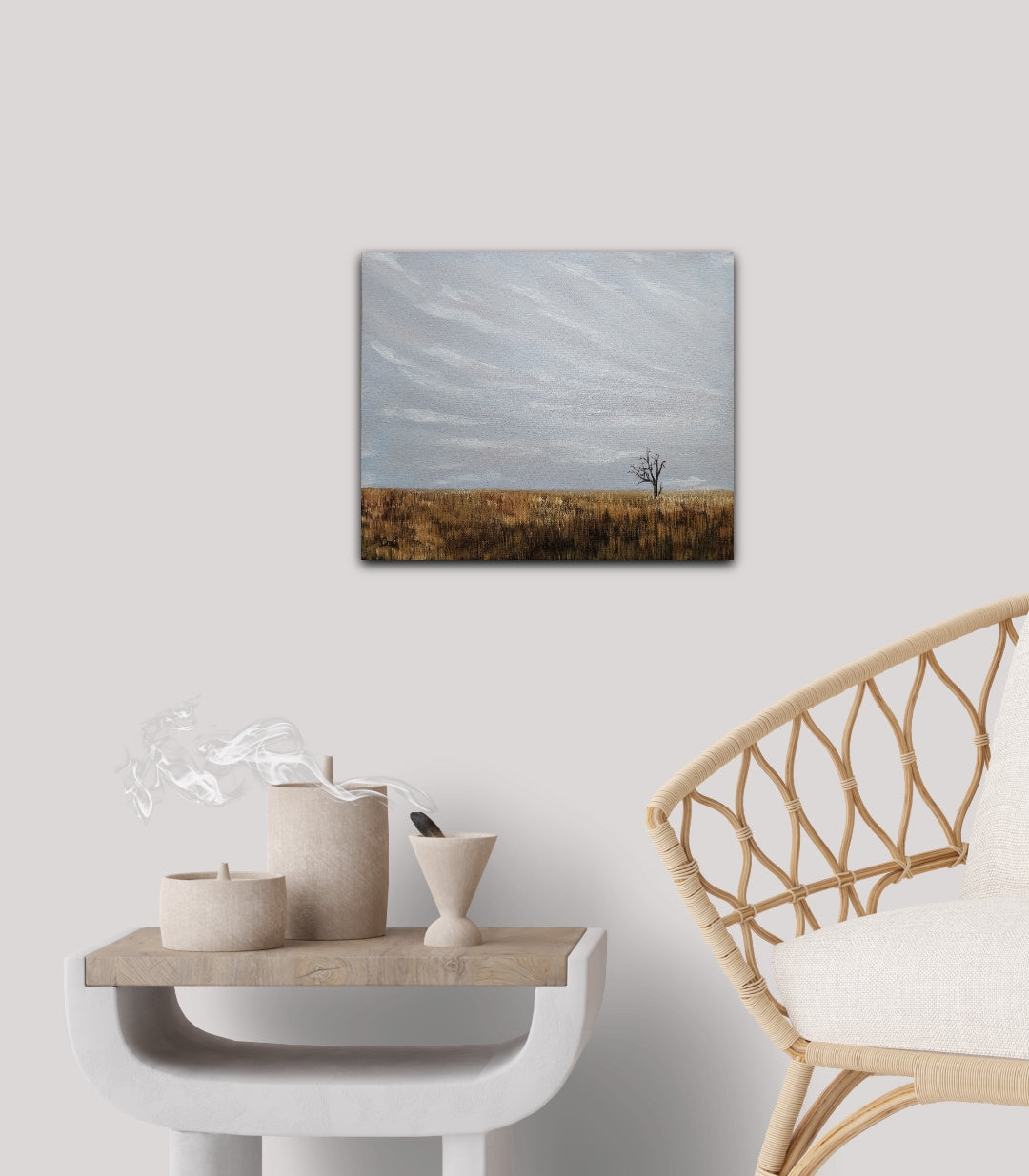  oil landscape painting of a single solo tree in a golden fall field under a grey/blue sky on a white wall 