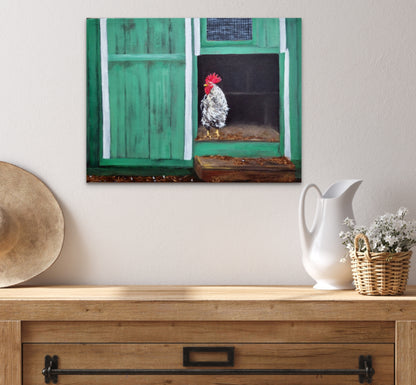 Decorative setup with a painting of a rooster on a green door, a white pitcher, and a woven basket on a wooden surface.