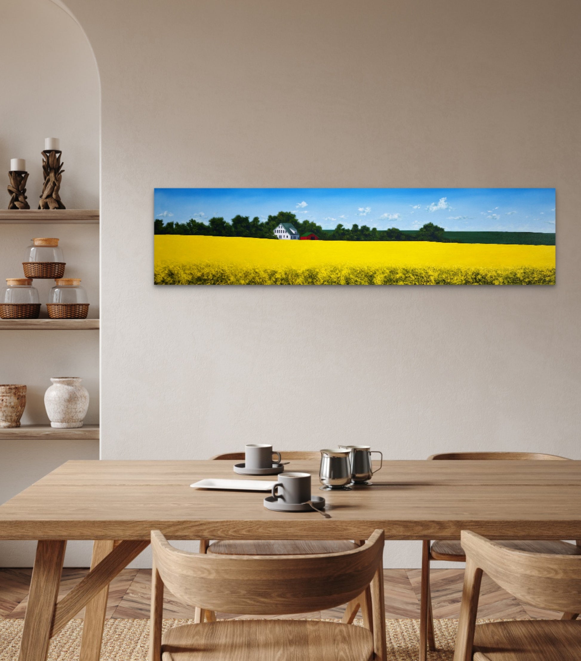Dining room with a large landscape painting of a yellow field on the wall.