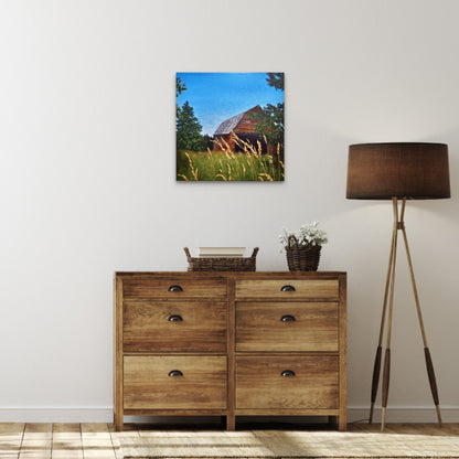 Wooden dresser with a lamp and decorative items in a room setting